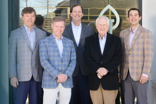 James B. Trotter with team