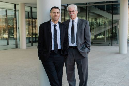 Joshua D. Hecht with colleague