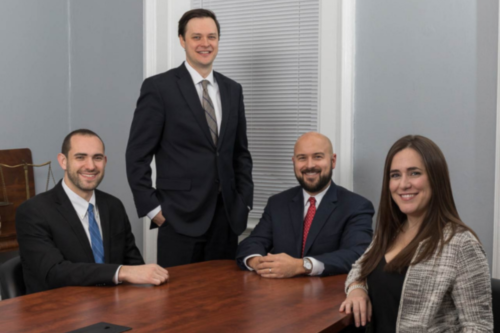 Steven M. Katz with team