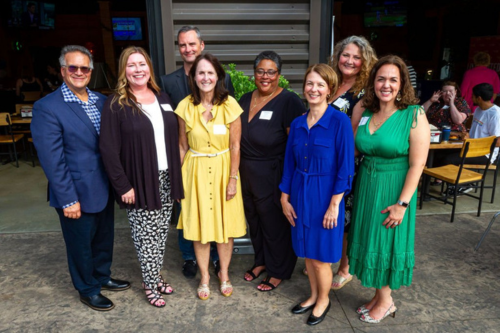 Lauren M. Hopwood with team