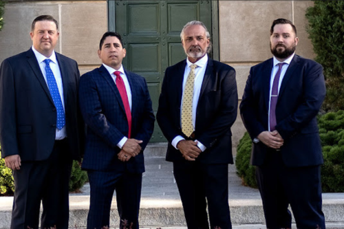 Raul F. Guerra with team