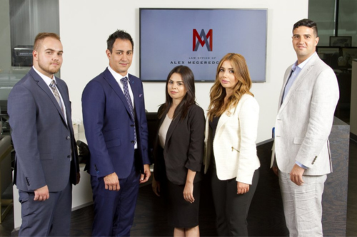 Alex Megeredchian with team