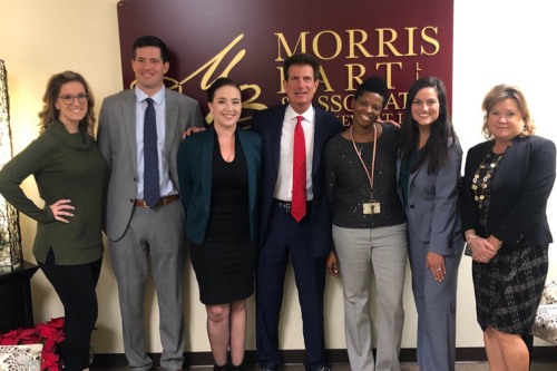 Morris Bart with team