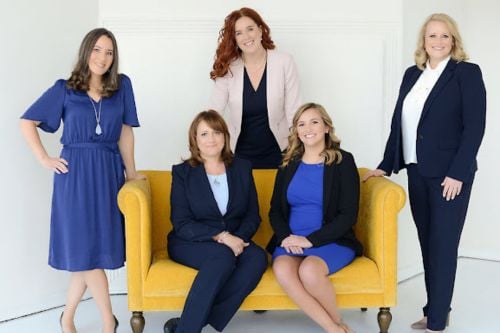Teri M. Nelson with team