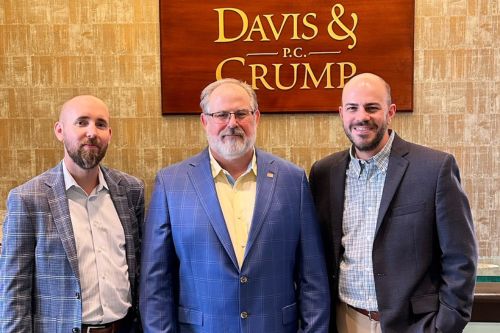 Martin D. Crump with his team
