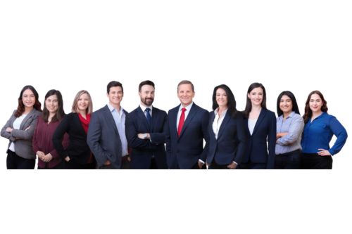 Herbert W. Auger with team