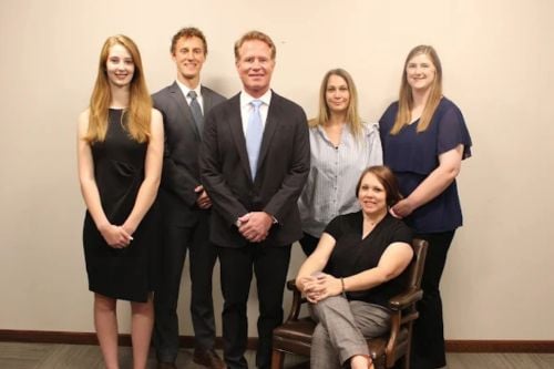 Darin H. Luneckas with team