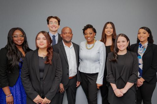 Karine E. Sokpoh With Team