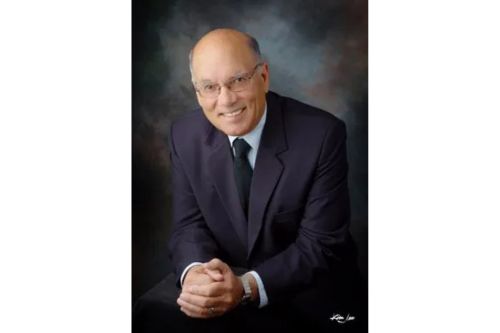 John A. Budagher Solo