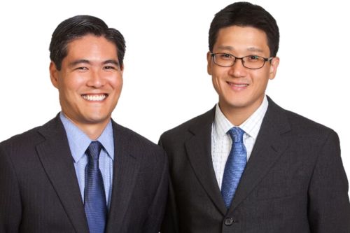 RAYMOND C. CHO with team