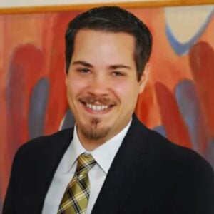 Tyler J. Waad