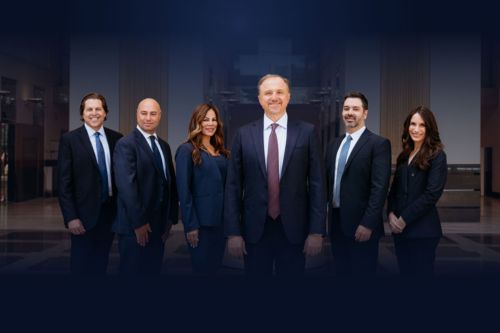 John Demas-with his team