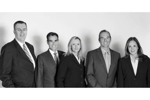 Daniel W. Munley with team