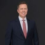 Gregory E. Gudin