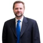 John P. Karoly