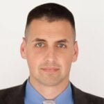 Justin L. Magill