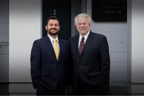 Benjamin M. Muth With Partner
