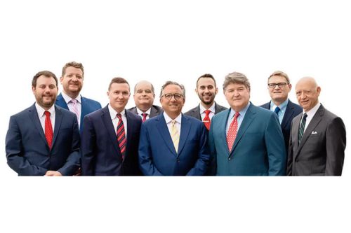 C. Mark Warren with team