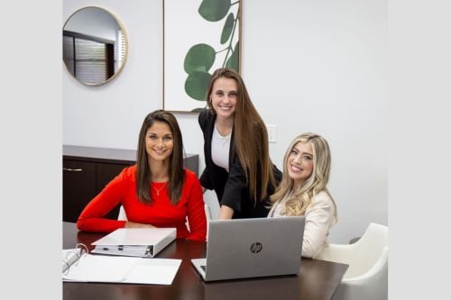 Cristen H. Martinez with team