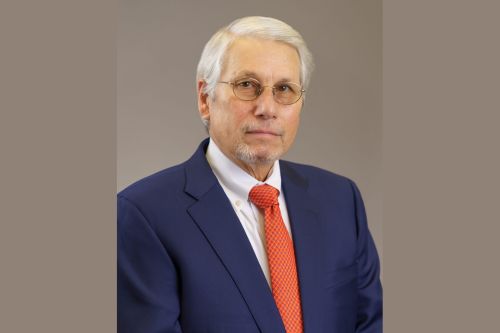 Charles E. Spedale Solo