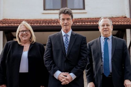 Jonathan R. Brockman with team