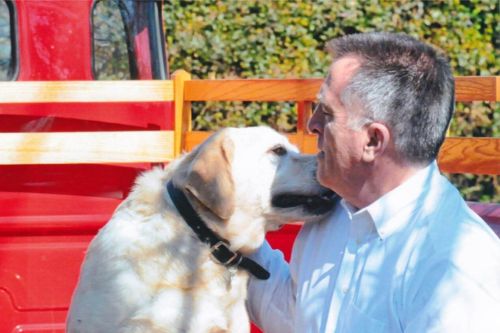 Matthew J. Baker with dog
