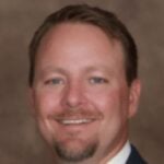 Gregory M. Tucker