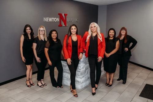 Jazmin E. Newton with team