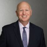 John E. Larson