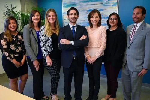 Hart J. Levin with team
