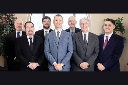 Michael P. Faith With Team