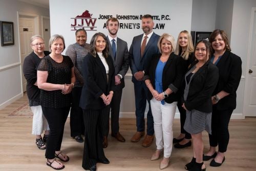 Whitaker R. Johnston With Team