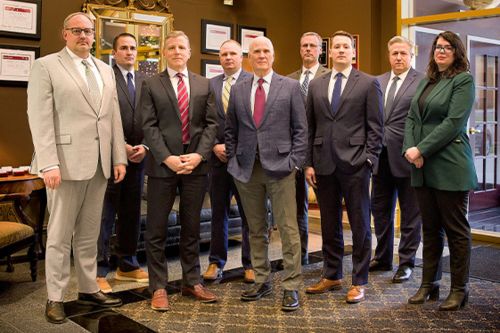 Patrick O. Dunphy With Team