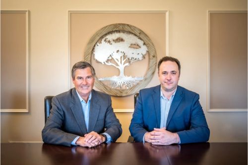 Robert M. Koch With Partner