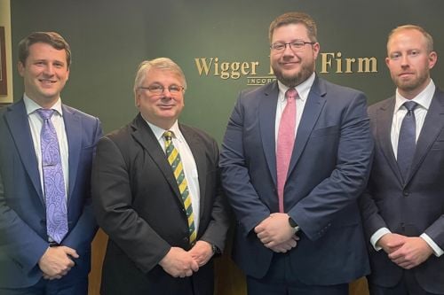 Jarrel L. Wigger with team