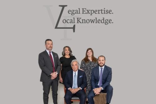 Tash J. Van Dora with team