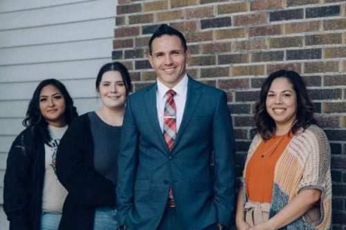 Nathan D. Rivera with team