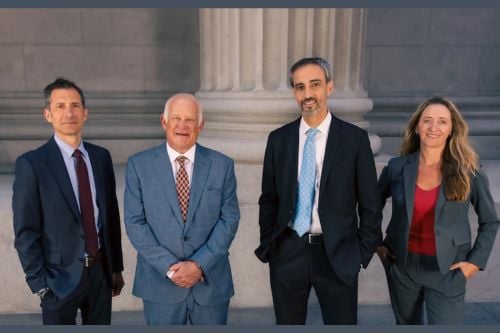 Andrew M. Zacks with team
