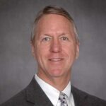 James A. Knauer