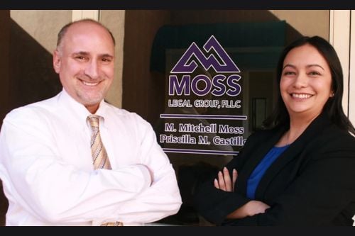 M. Mitchell Moss with team