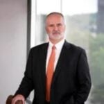 David E. Schumacher