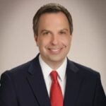 Adam B. Buckman