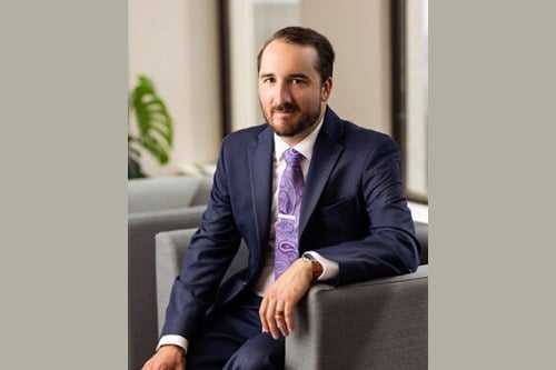 Adam J. Kost
