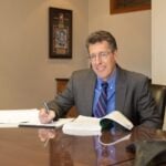 Greg J. Theo