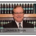 James E. Riha