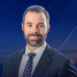 Christopher J. Simmons