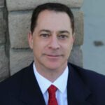 Mark J. Markus