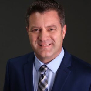 Adam M. Warnke