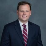 T. Adam Hoekenschnieder