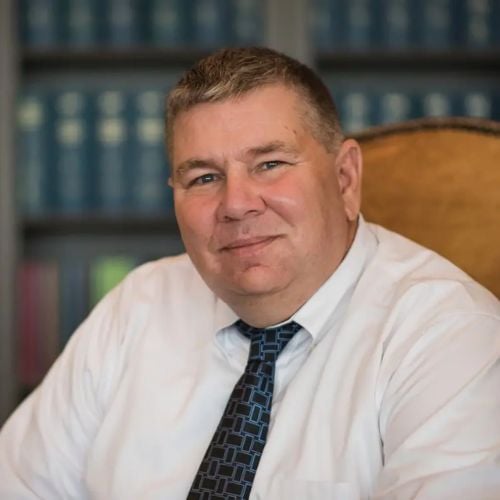 Michael W. Dixon (“Mike”)